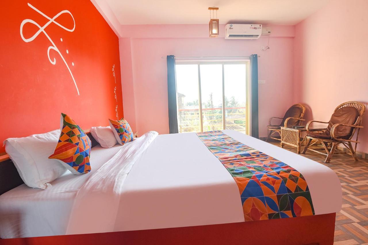 Hotel Fabexpress The Voyage Morjim Exterior foto